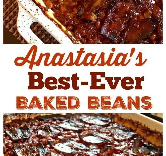 Bowl of Anastasia's best-ever baked beans served hot and garnished.