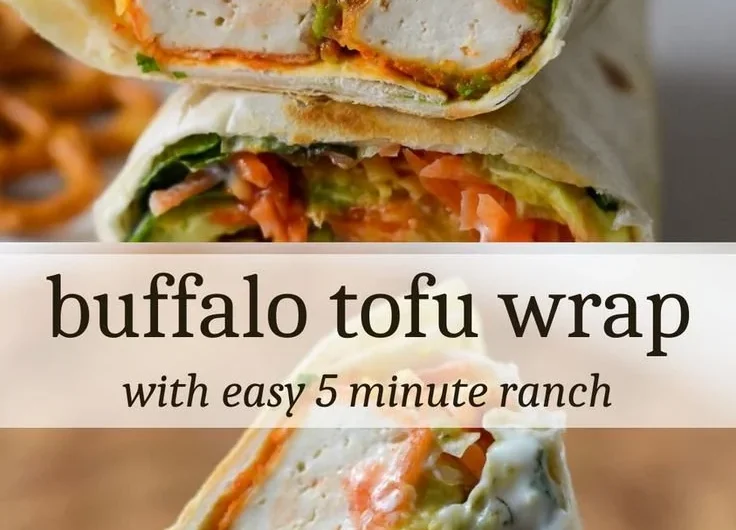 Buffalo Tofu Wrap with fresh vegetables and spicy sauce.