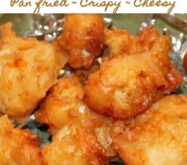 Crispy cheddar fried cauliflower bites served as a snack or appetizer