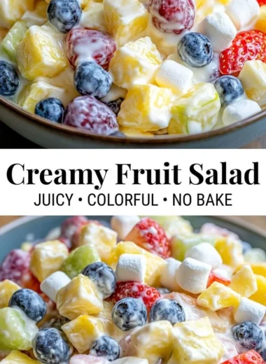 Creamy fruit salad with fresh assorted fruits in a bowl