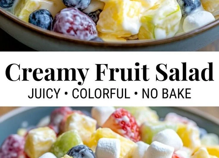 Creamy fruit salad with fresh assorted fruits in a bowl
