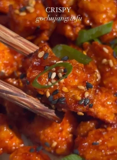 Delicious Gochujang Tofu dish garnished with greens