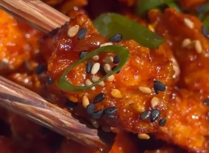 Delicious Gochujang Tofu dish garnished with greens