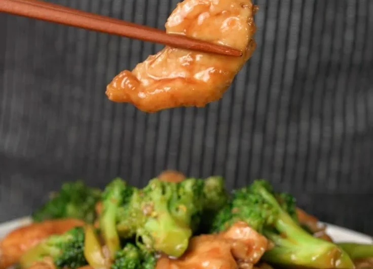 Delicious chicken broccoli stir fry served in a colorful bowl