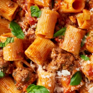 A bowl of classic Bolognese sauce served with spaghetti.
