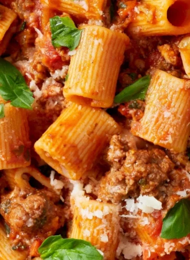 A bowl of classic Bolognese sauce served with spaghetti.