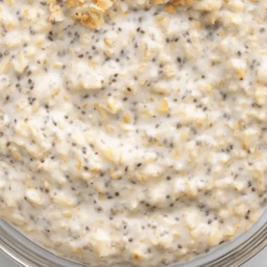Delicious Coconut Cream Pie Overnight Oats topped with coconut and fruit