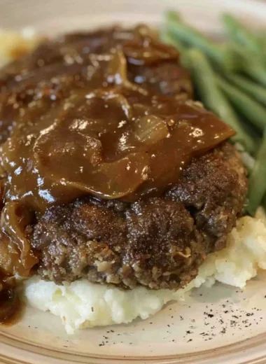 Delicious easy Salisbury steak served with gravy and mashed potatoes