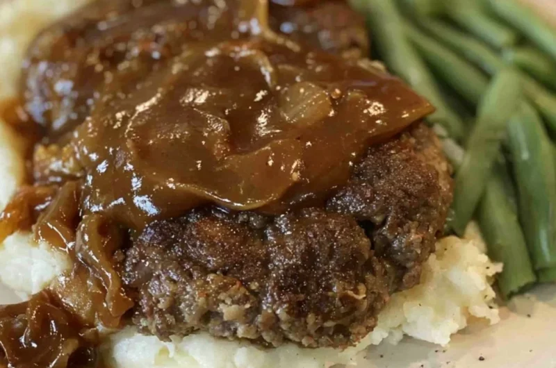 Delicious easy Salisbury steak served with gravy and mashed potatoes