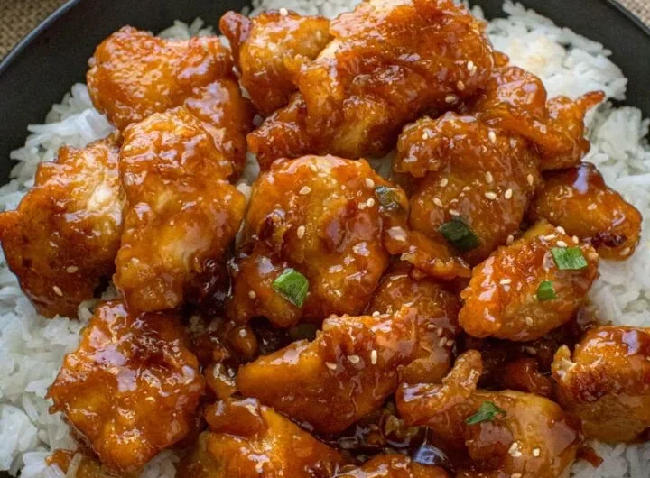 Plate of General Tso's Chicken with rice and vegetables
