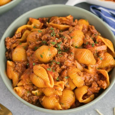 High protein taco pasta served in a bowl with toppings