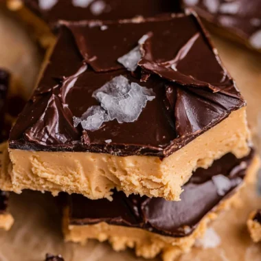 Peanut Butter Chocolate Greek Yogurt Bark topped with nuts and chocolate.