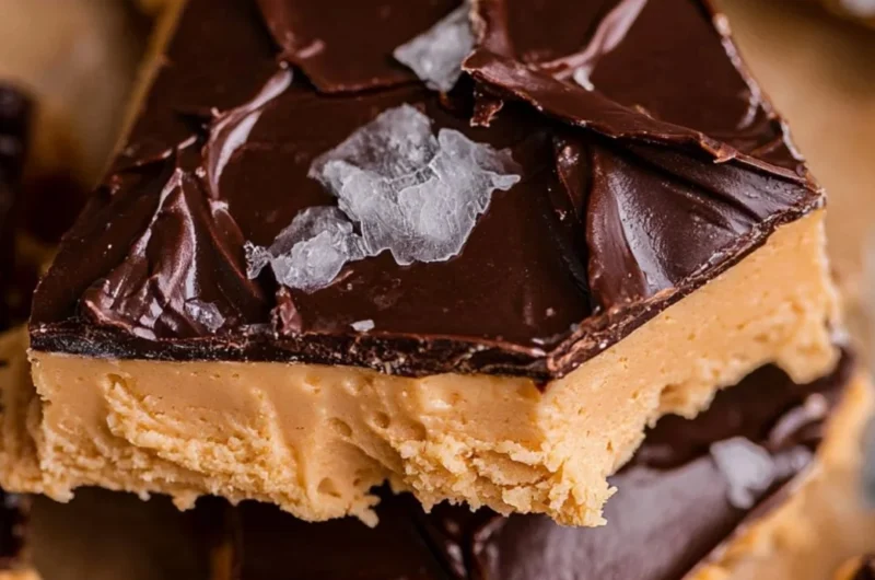 Peanut Butter Chocolate Greek Yogurt Bark topped with nuts and chocolate.