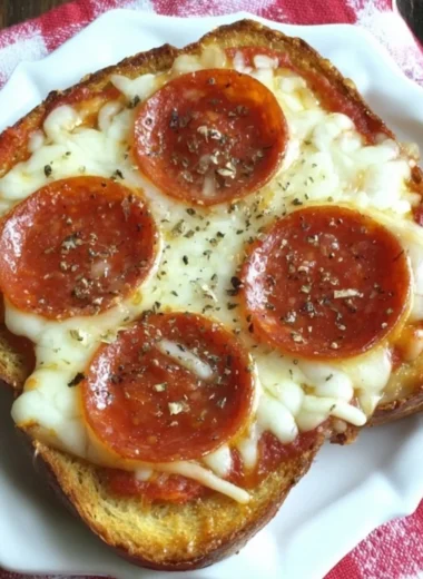 Delicious garlic toast pizzas topped with fresh ingredients and melted cheese