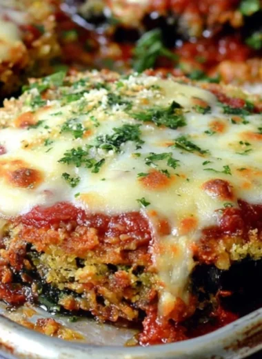 Sheet Pan Eggplant Parmesan dish with layers of eggplant, cheese, and sauce