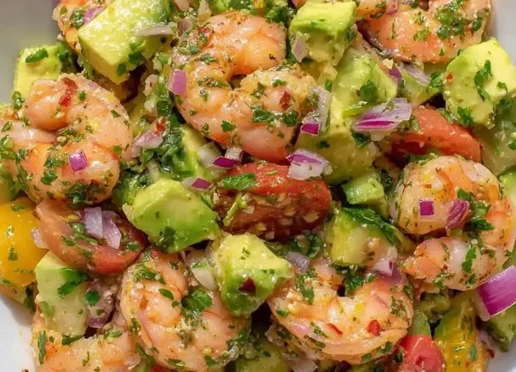 Fresh shrimp salad with vibrant vegetables and a zesty dressing