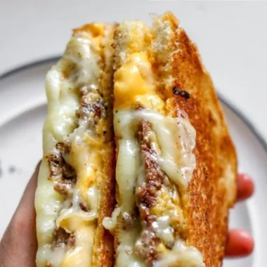 Delicious Smashburger Grilled Cheese sandwich with golden, melted cheese