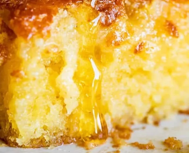 Freshly baked honey cornbread, sweet and moist, served warm with butter.