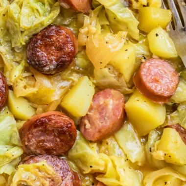 Hearty bowl of cabbage potatoes and sausage meal