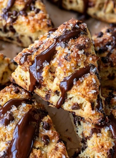 Cozy sourdough discard scones served on a rustic wooden table.