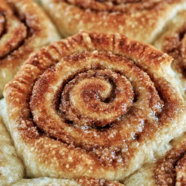 Freshly baked easy one hour cinnamon rolls topped with icing
