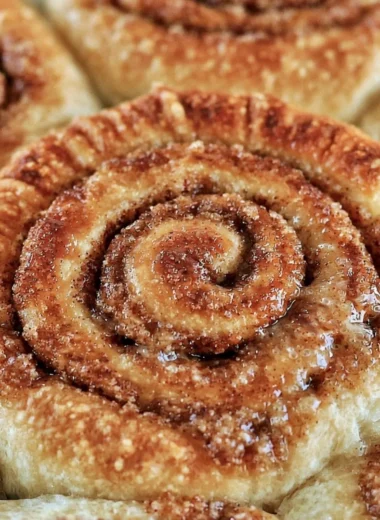 Freshly baked easy one hour cinnamon rolls topped with icing