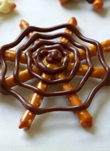 Halloween Chocolate Pretzel Spider Web decorated with white gunpowder