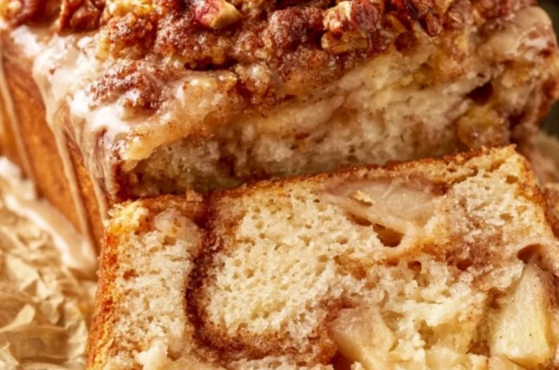 Moist and tender cinnamon apple bread loaf with cinnamon and apples.