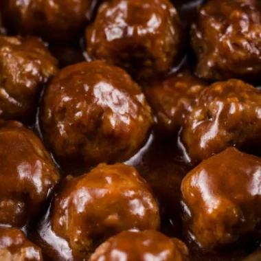 Delicious Slow Cooker Salisbury Steak Meatballs served with creamy mashed potatoes