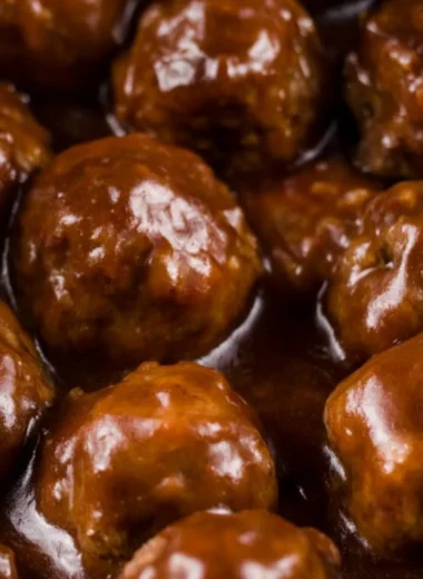 Delicious Slow Cooker Salisbury Steak Meatballs served with creamy mashed potatoes