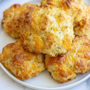 Delicious sourdough cheddar biscuits fresh out of the oven
