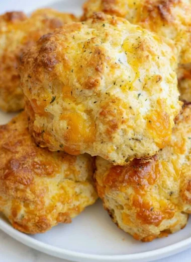 Delicious sourdough cheddar biscuits fresh out of the oven