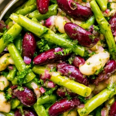 Three Bean Salad with colorful beans and vegetables in a serving bowl