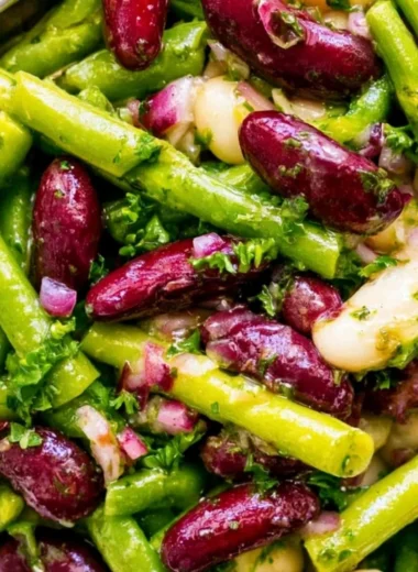 Three Bean Salad with colorful beans and vegetables in a serving bowl