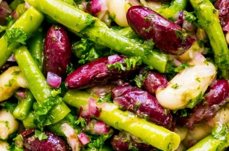 Three Bean Salad with colorful beans and vegetables in a serving bowl