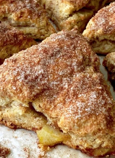 Cozy apple scones freshly baked and served on a wooden table