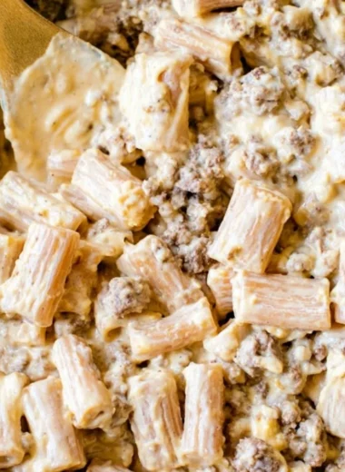 Cozy cheeseburger pasta skillet served in a pan with toppings
