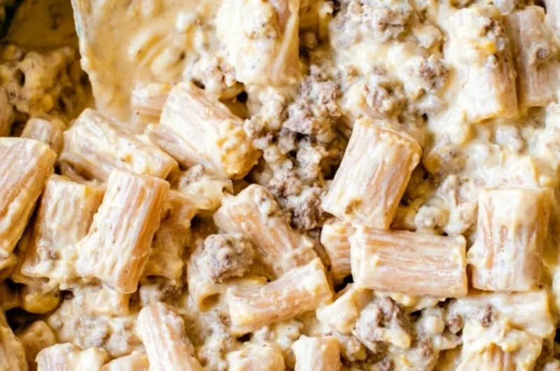 Cozy cheeseburger pasta skillet served in a pan with toppings